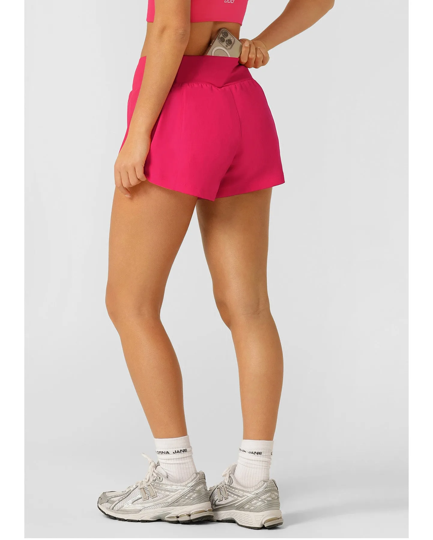 Lorna Jane Stretch and Stride Pocket Run Short - Neon Raspberry